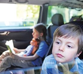 Car Window UV Protection Child Looks Out Of UV Protected Car Window