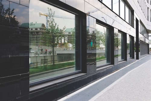 Graffiti Prevention Strategies Clean Black Building With Glass Panels